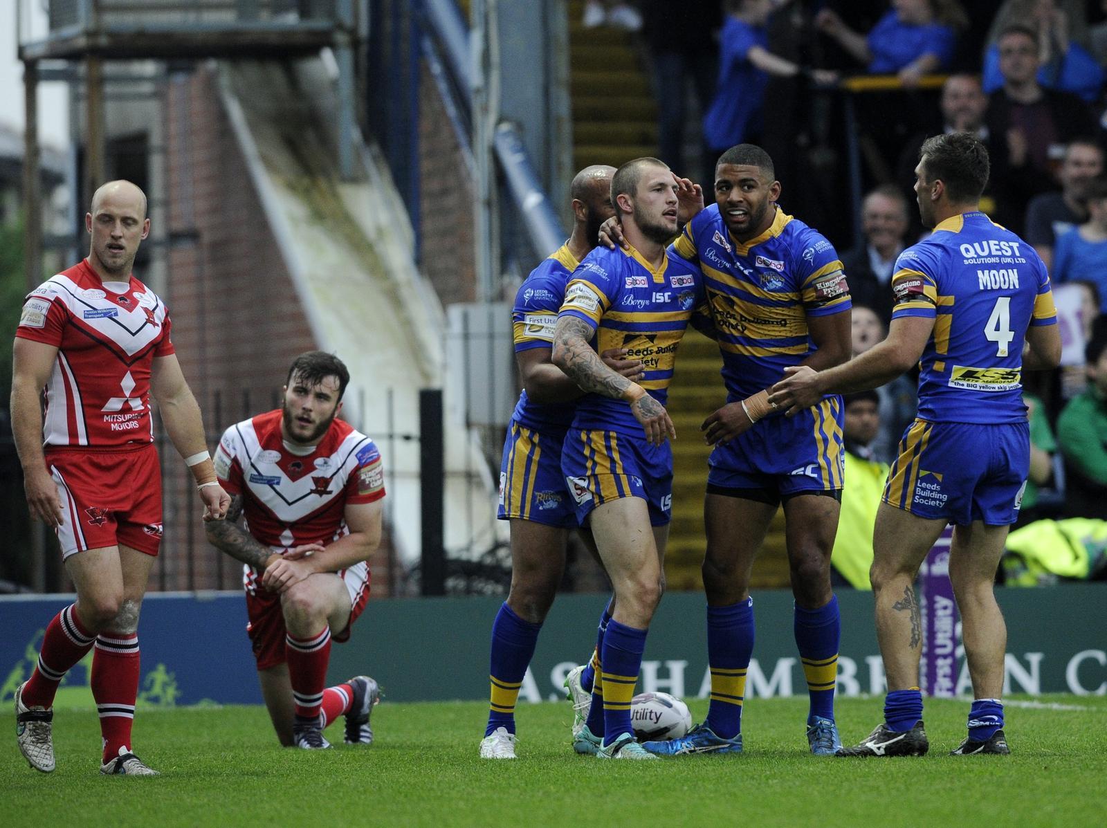 Luke Briscoe is congratulated after his crucial try agianst Salford in 2016. Picture by Bruce Rollinson.