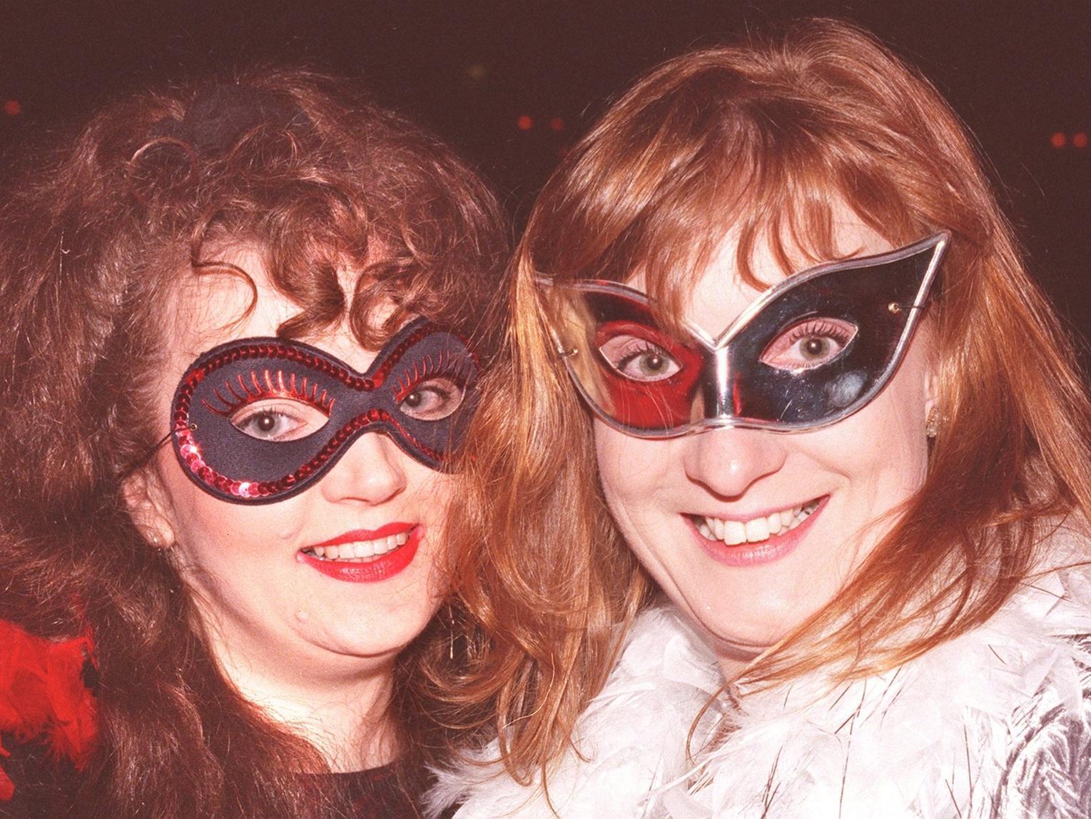 Karen Sylvian (left) and Susan Davis enjoy the Millennium celebrations