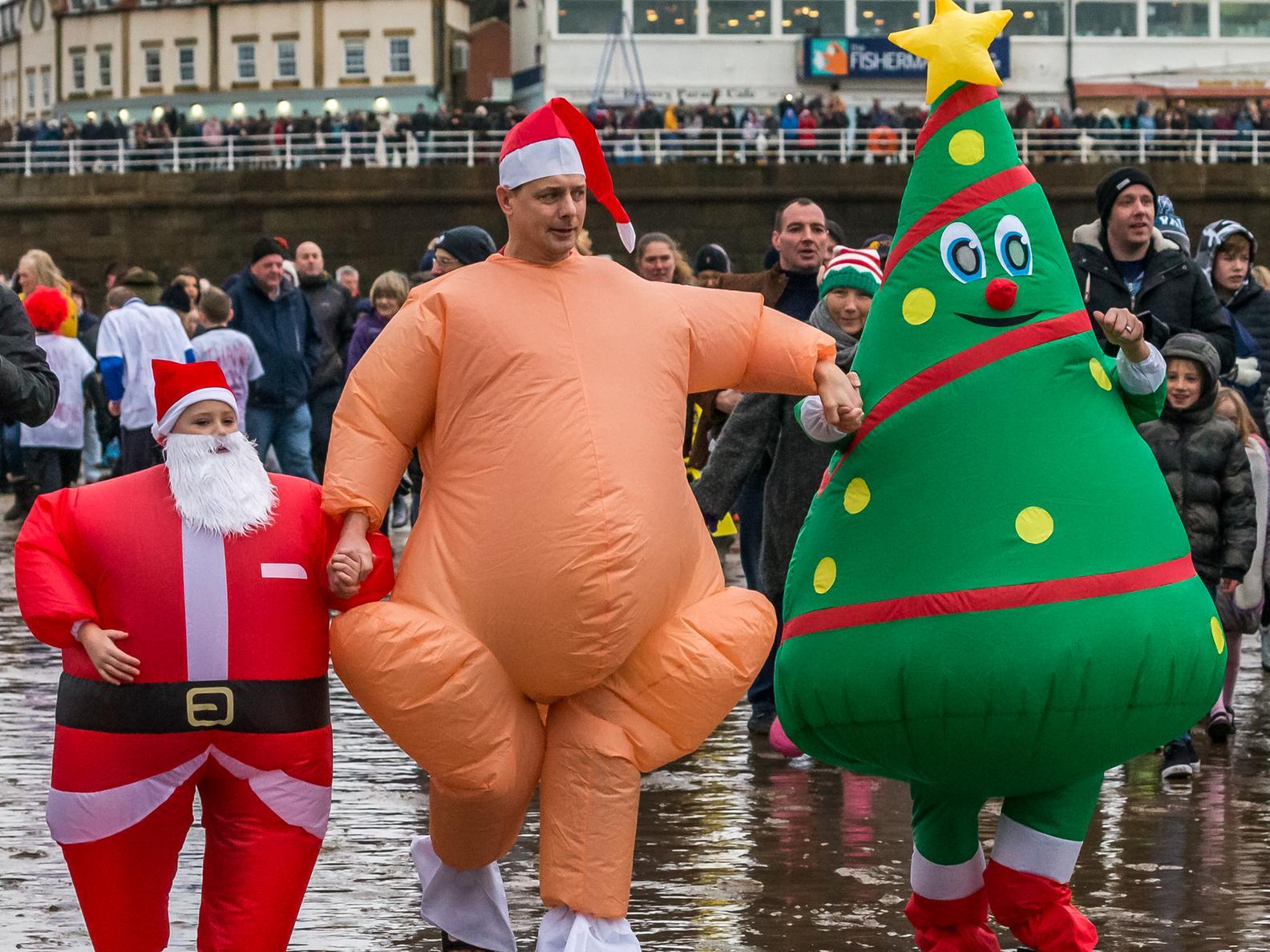 Santa, a turkey, even a Christmas tree, taking part in the dip.