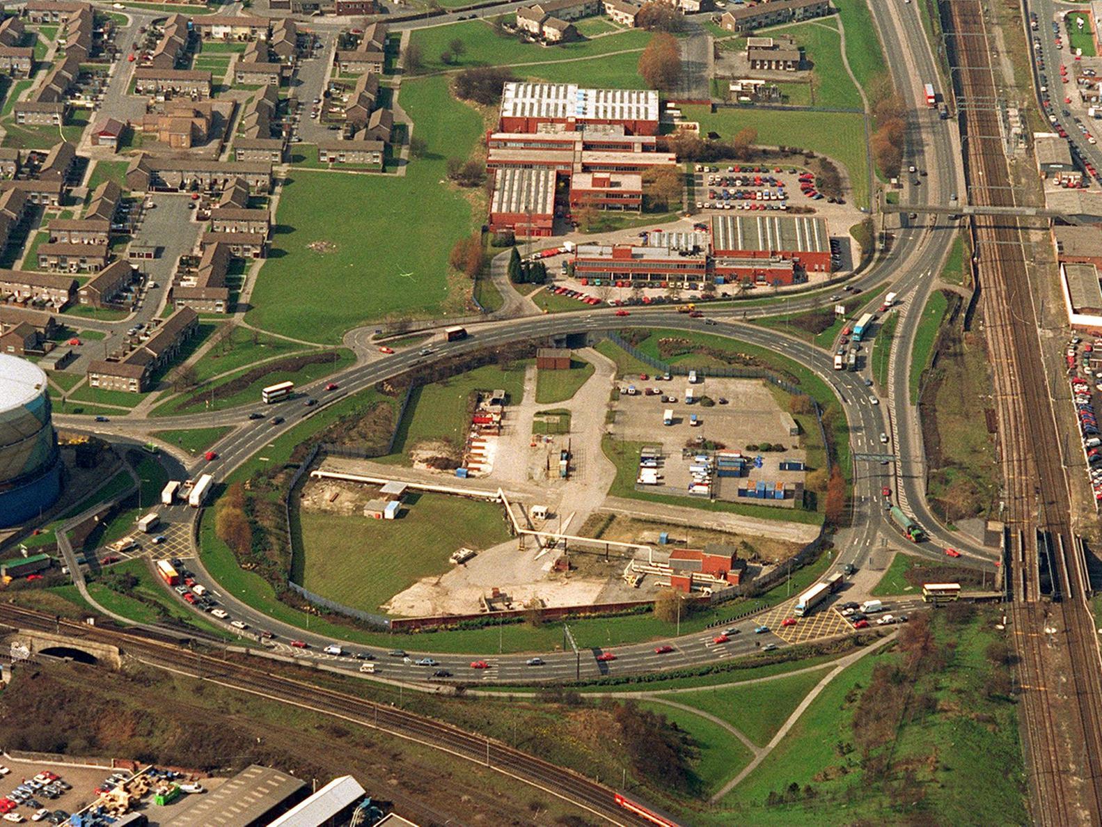 An aerial view of Armley Gyratory in the mid 1990s. Armley Road runs off up to the top right.