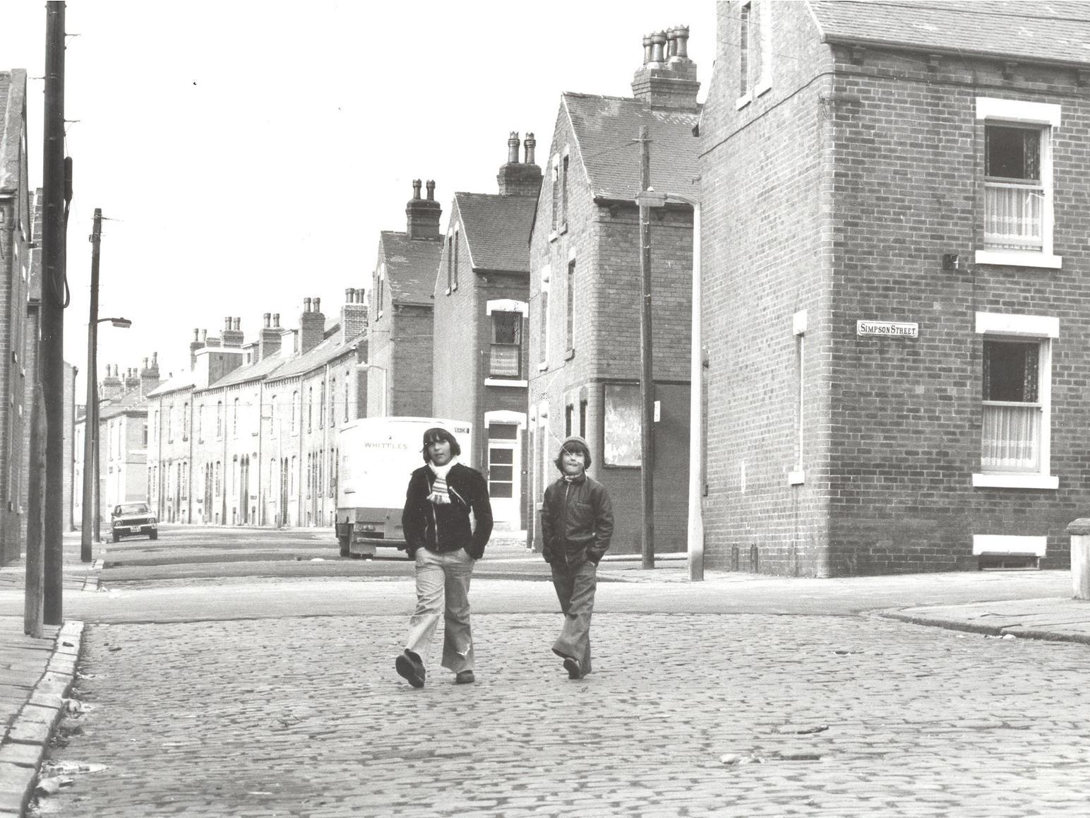 Middle Cross Street in Armley. One of the lads on this photo is wearing a Leeds United scarf.