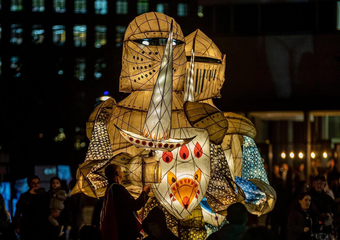Handmade parade Light Knights battle outside the Royal Armouries as part of Light Night Leeds 2019.