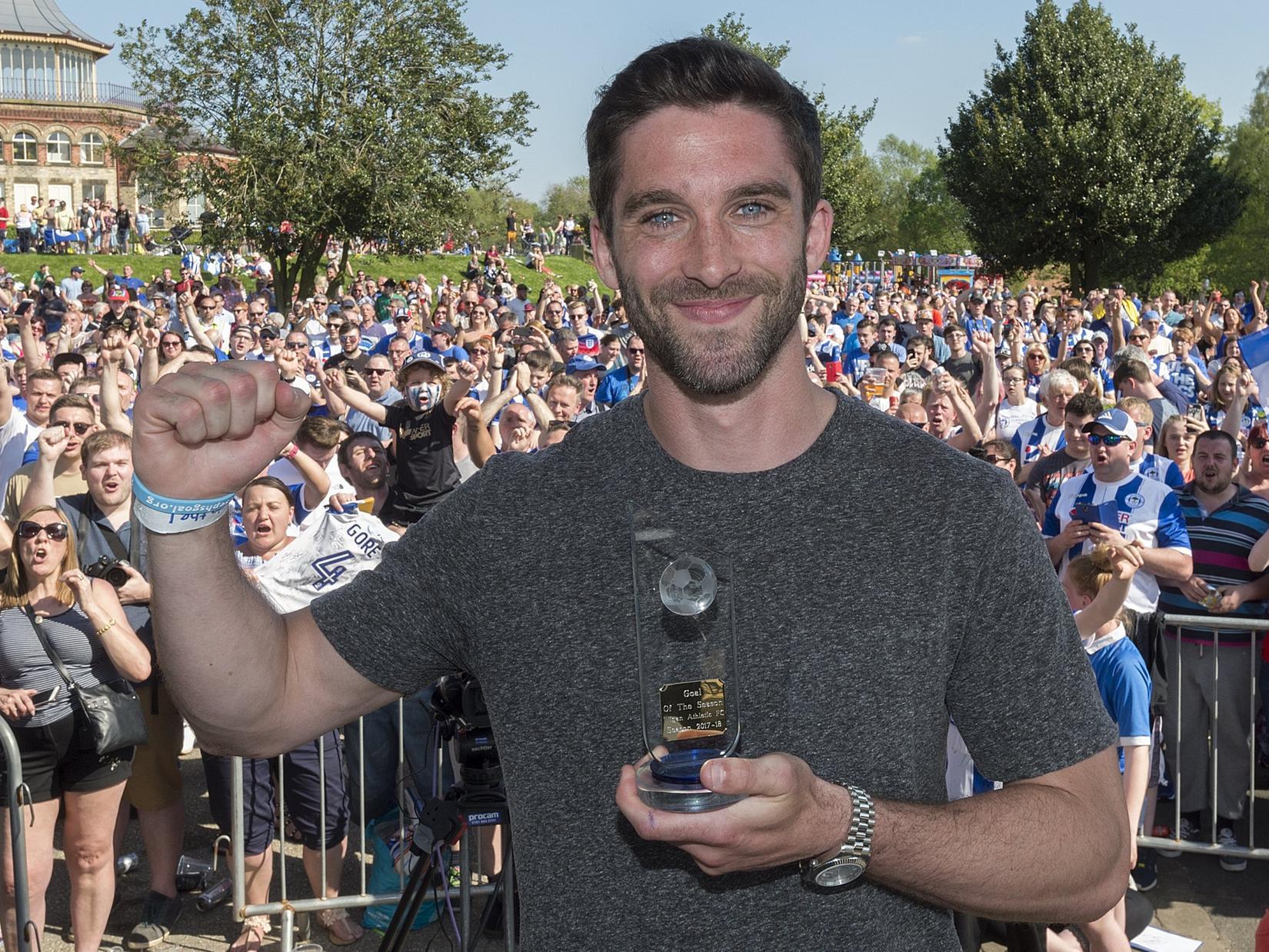 FORWARD: WILL GRIGG-Became the most famous footballer on the planet in the summer of 2016, when his exploits in firing Latics to the League One title saw the coining of the mostgenius terrace chant of all-time. Was back on fire against Manchester City in 2018, when his goal halted their matrch towards an unpredented quadruple.