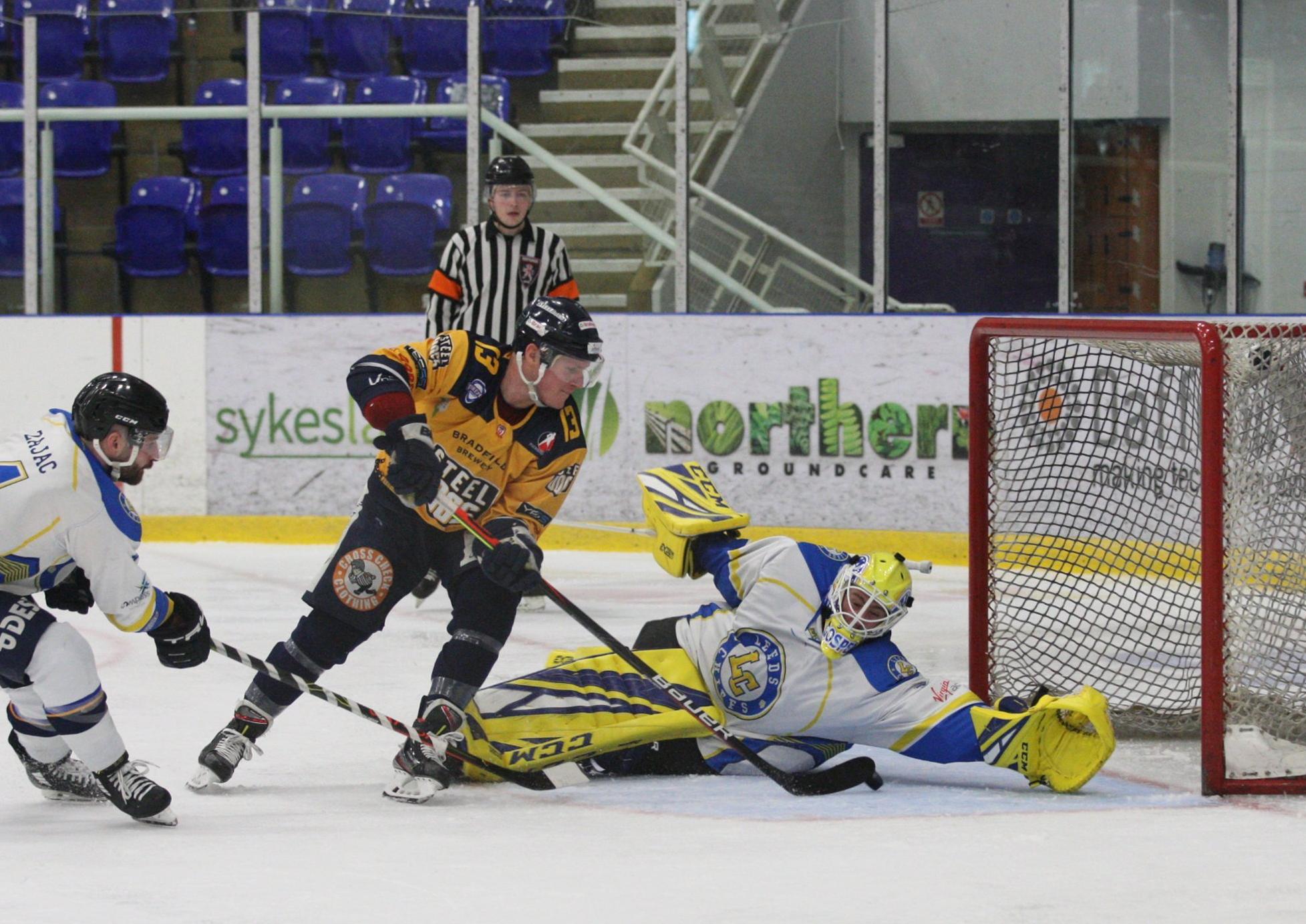 Craig Elliott backhands past Sam Gospel on the power play to make it 7-0 to Sheffield Steeldogs. Picture courtesy of Cerys Molloy.