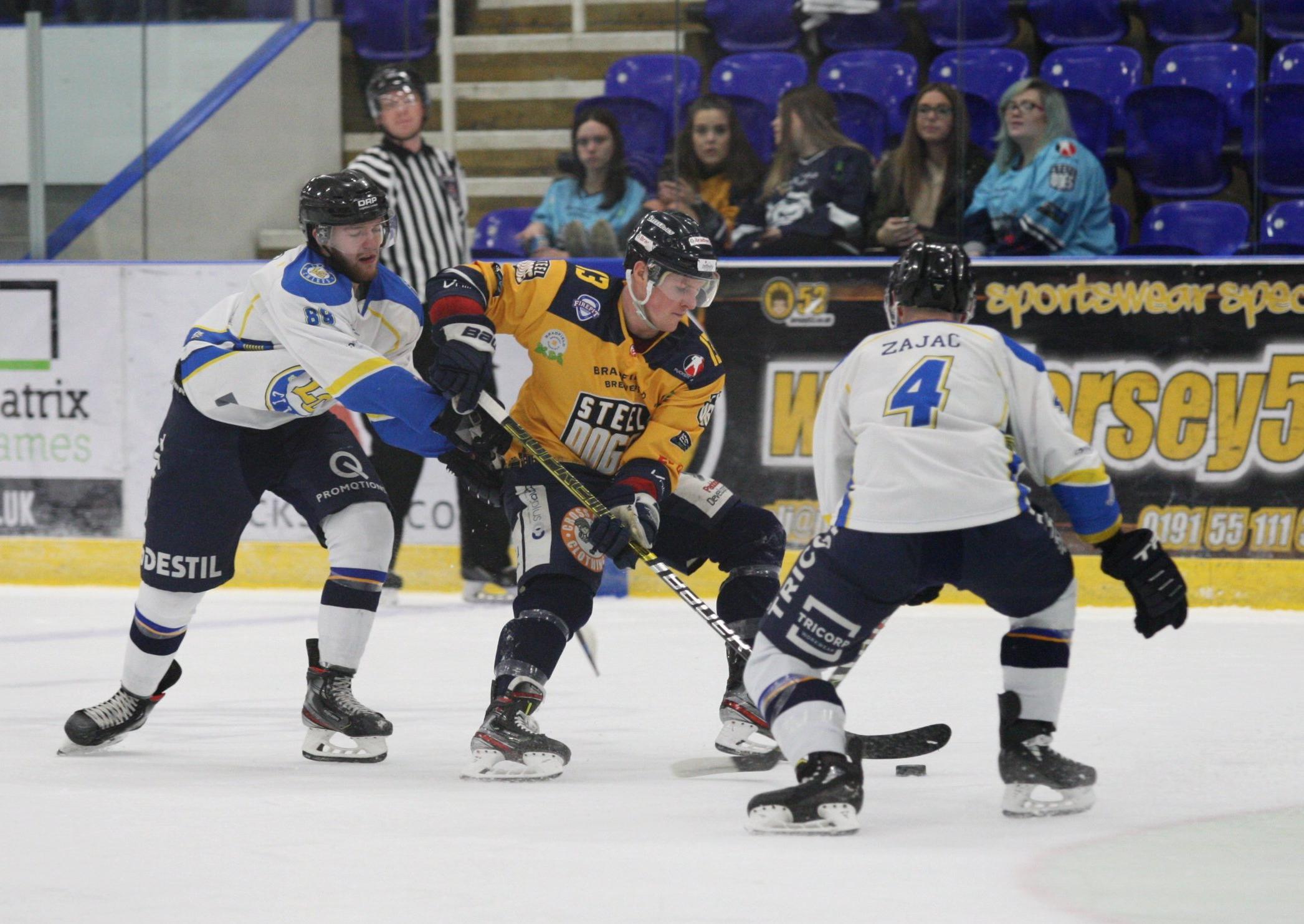 Leeds Chiefs' Adam Barnes, left, and Sam Zajac try to dispossess Sheffield Steeldogs' Craig Elliott. Picture courtesy of Cerys Molloy.