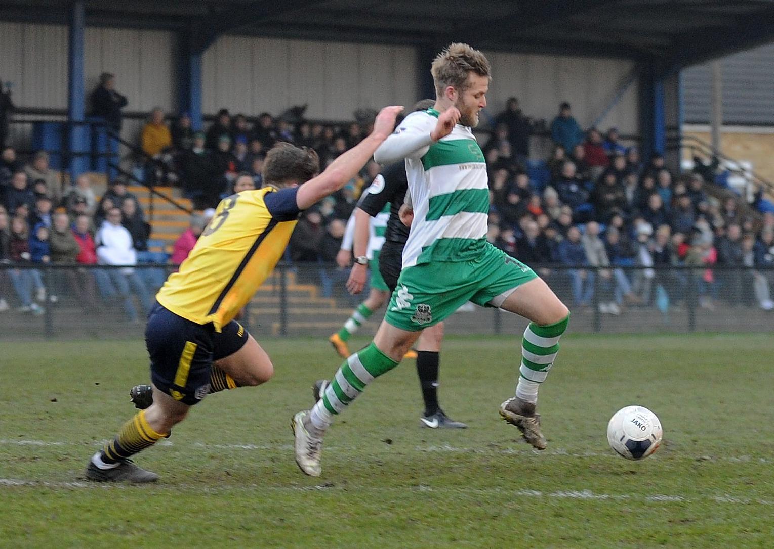 Will Hayhurst on a run for  Farsley Celtic against Guiseley.