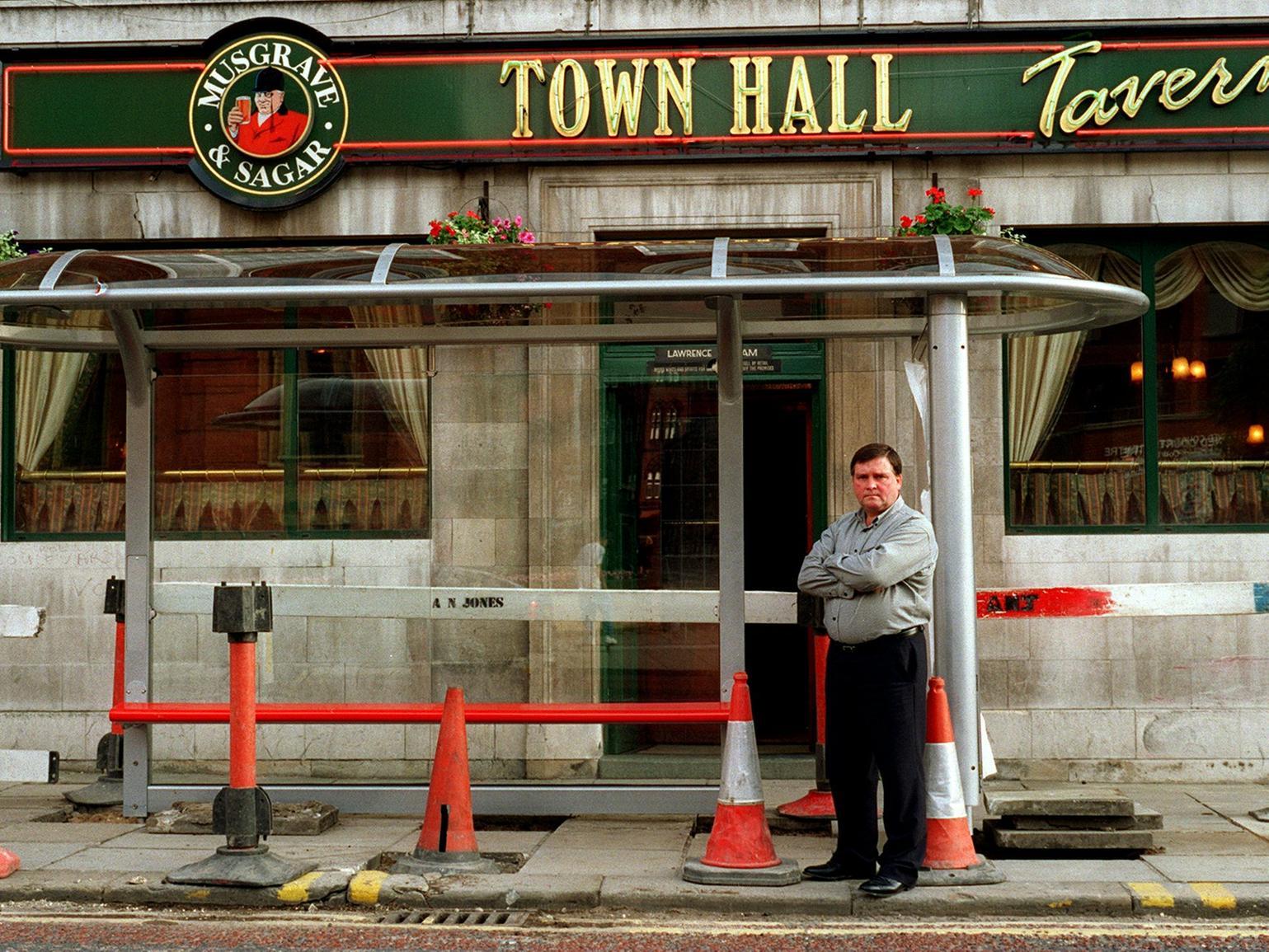 This is Laurie Graham, licensee of the Town Hall Tavern on The Headrow, who was unhappy about a bus shelter being put up in front of his pub. Pictured in August 1996.