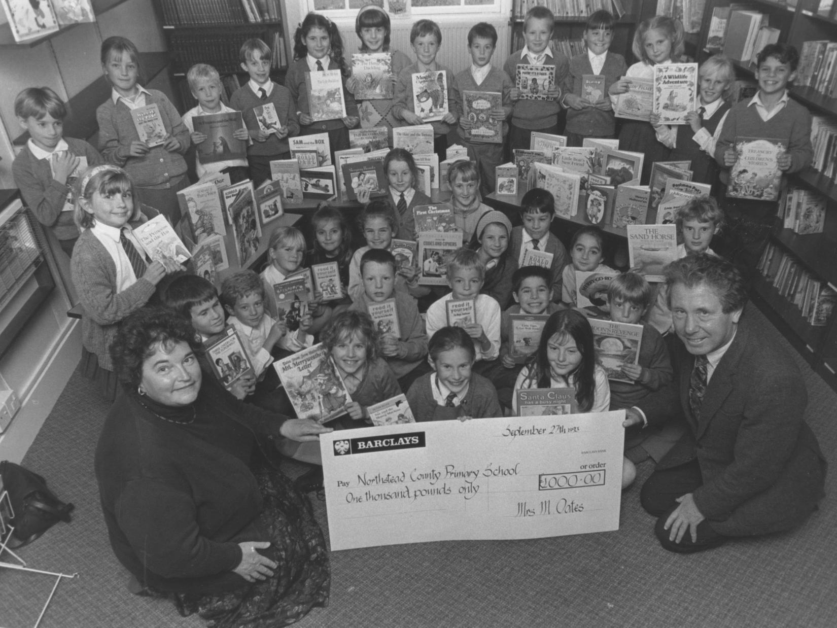 In September 1993 Marjorie Oates, treasurer for the Friends of Northstead School presented a cheque for 1,000 for reading books raised from the summer fair to headmaster Keith Revell, along with some of class 15 children holding some of the books.