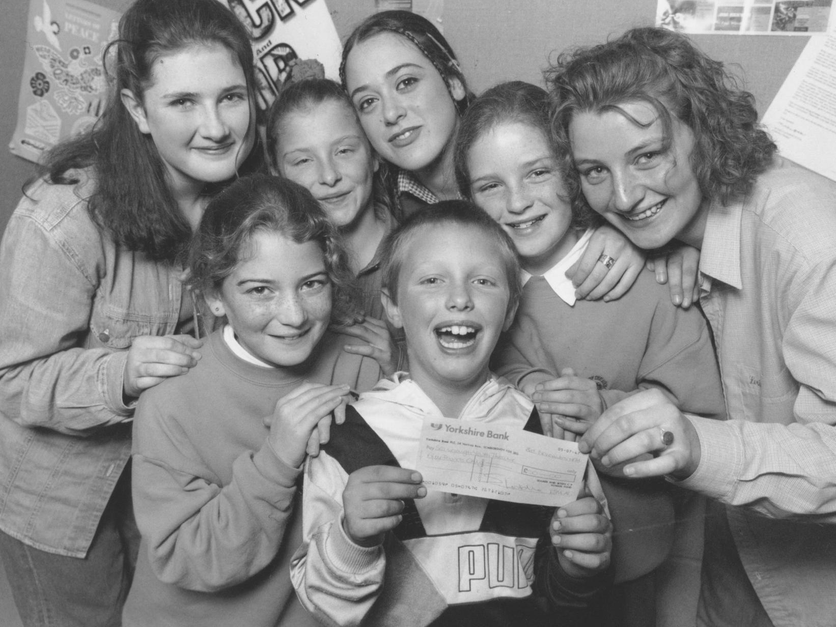 Seamer and Irton School pupils handed over a 50 cheque to members of the Scarborough Youth Theatre in November 1994. Pictured are actresses Sarah Fettes, left, Francesca Santamaria, centre, and Becky Jackson, left, with pupils Jessica Hall, second left, Wendy Peers, Mark Storeman, and Hayley Botham.