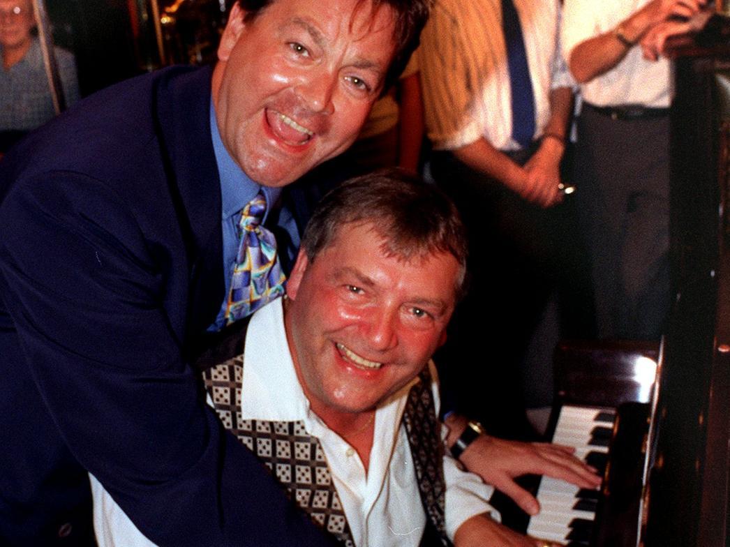 Clive Conlon, seated, was the winner of the Great Universal Leeds Pub piano comp. He is pictured with Bobby Crush who was guest judge at the finals held at the  Victoria Pub.