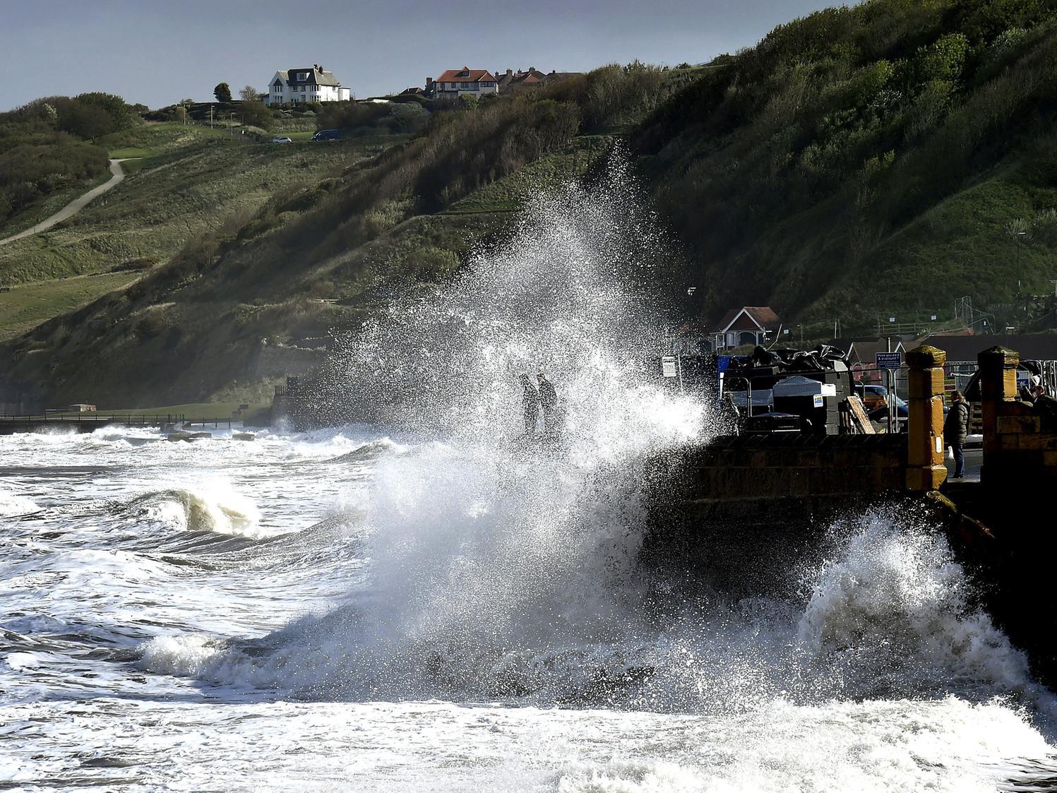 Heavy waves batter Scarborough's South Bay with onlookers taking huge risks. Photo: Richard Ponter