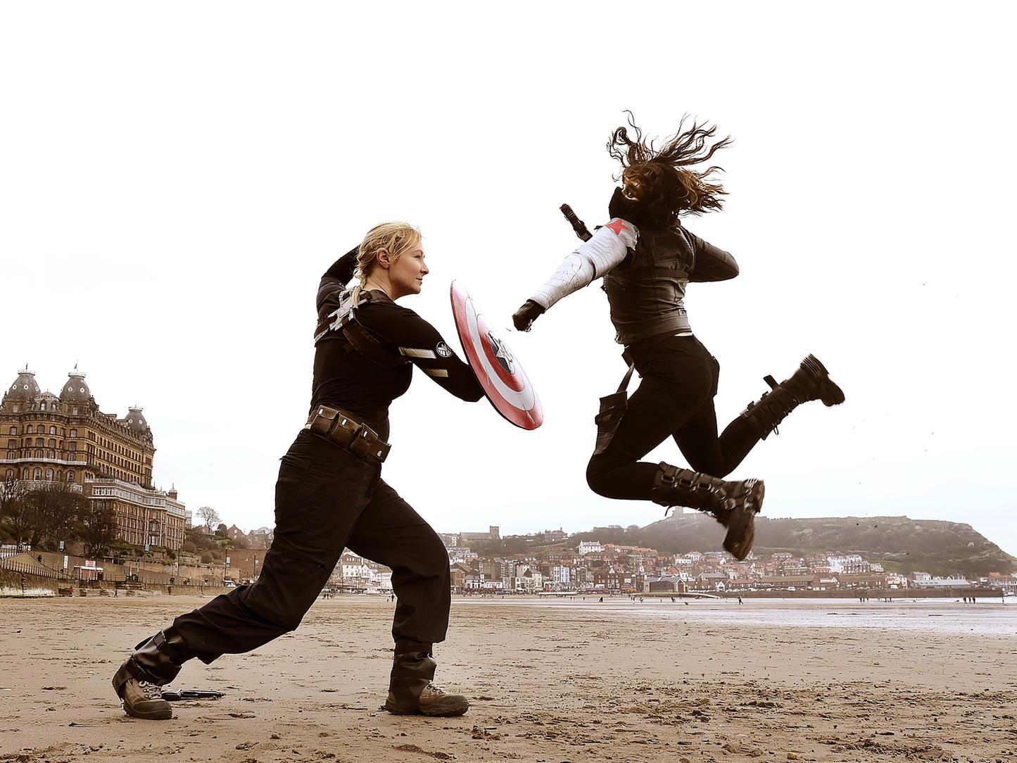 Scarborough Sci Fi Festival ... battling on the beach are Hannah Risdon as Captain America and Joey Gomez Mannion as The Winter Soldier. Photo: Richard Ponter