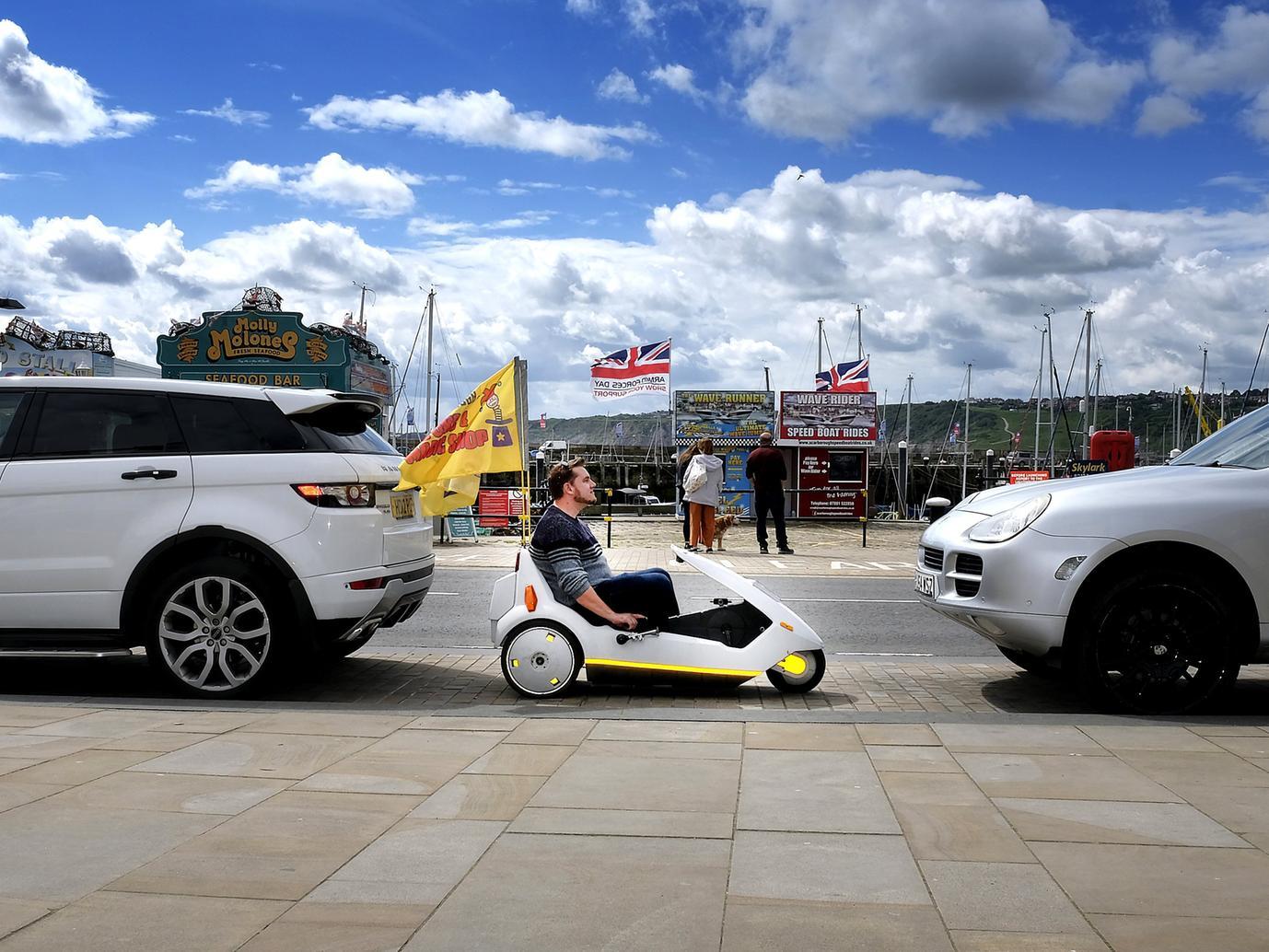 Scarborough businessman Miles Jackson parks his Sinclair C5, which in the 1980s was dubbed the transport of the future. Photo: Richard Ponter