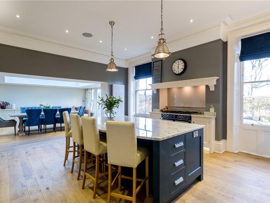 The large open plan kitchen is tastefully decorated.
