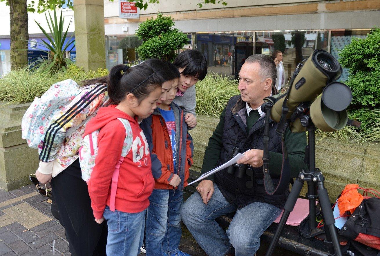 Wakefield Peregrine Project secretary and treasurer Francis Hickenbottom tells a group of children all about the birds during a nest watch.