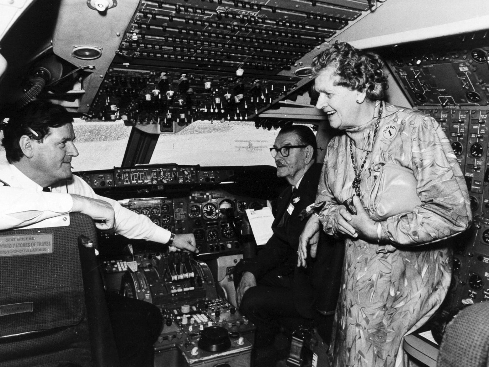 Captain Mike Webster shows his parents, William and Norah Webster, the flight deck of the Jumbo. There were cheers from the 400 passengers as it lifted into the air to become the first Jumbo to take off from Leeds Bradford Airport.