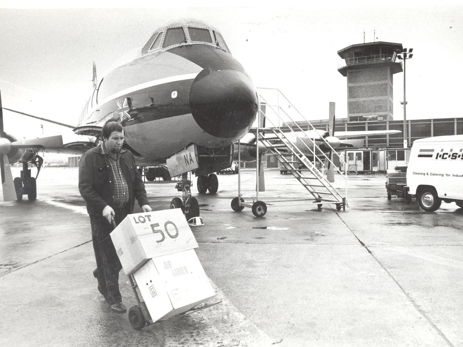 Cargo is unloaded. Freight facilities at the airport were always busy in the early 1980s.