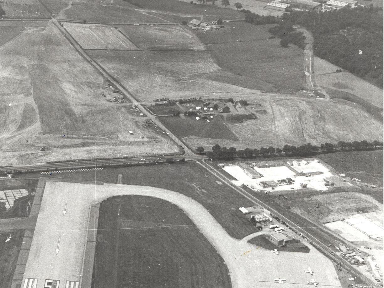 Another aerial view showing the work on the runway extension.