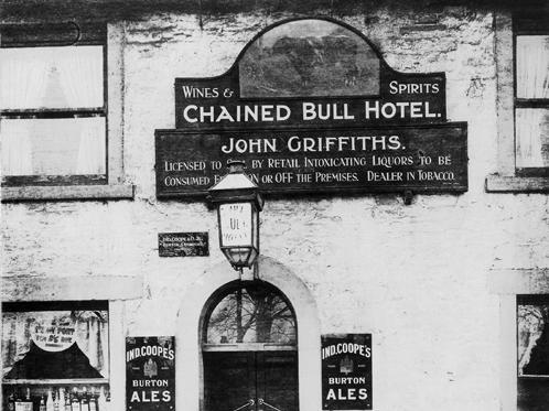 A close up of the entrance to the Chained Bull Hotel on Harrogate Road. John Griffiths is named as the licensee. A new Chained Bull hotel was in the process of being built at the time, just behind this one.