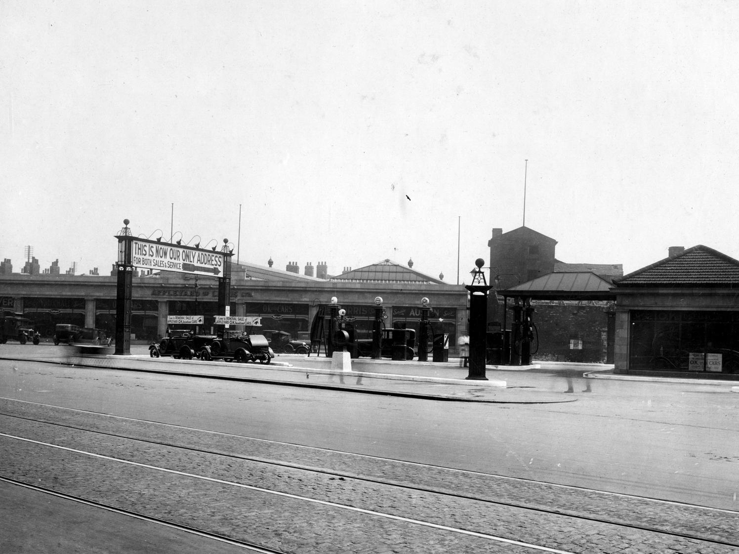 A view of the premises of Appleyard of Leeds Ltd. at the junction of North Street with Sheepscar Street South. This photo shows the car showroom, garage and petrol pumps.