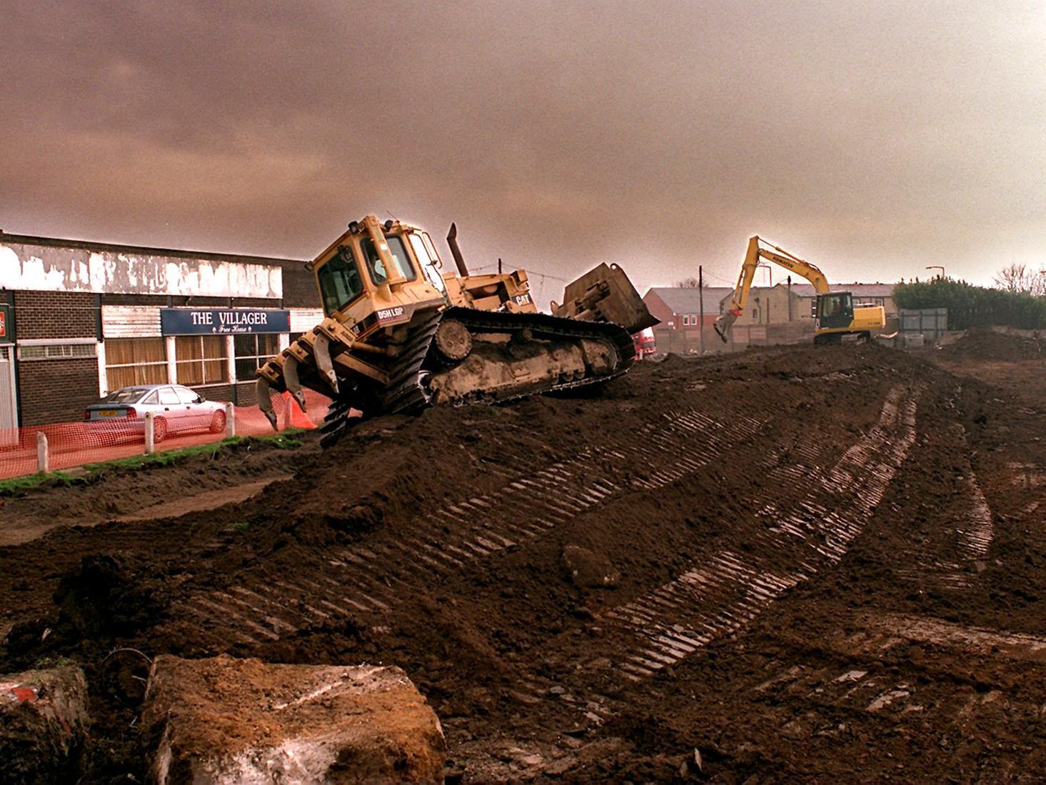 Diggers rip up the pitch  of the former Bramley Rugby League Club in March 1997. The area was going to be made into a housing development.