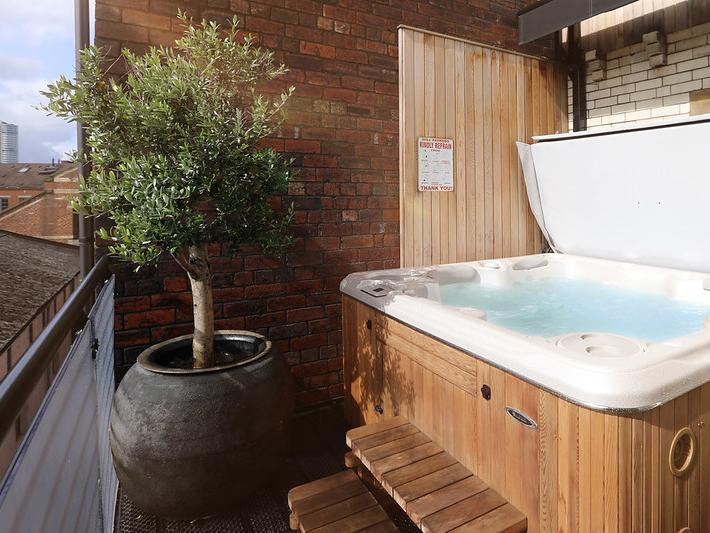 Take in views of Leeds from the hot tub.