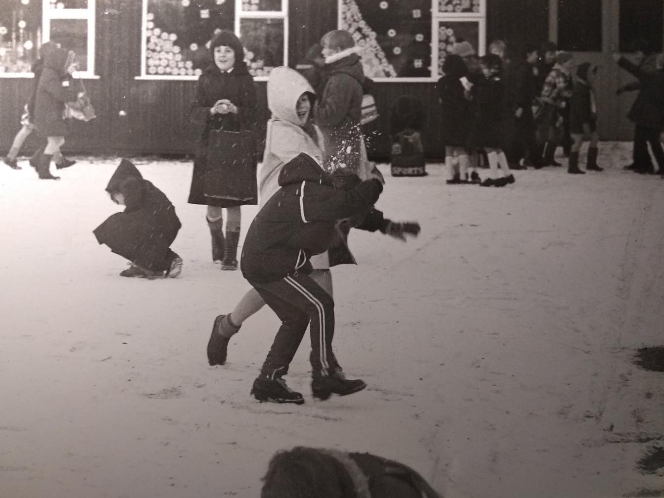 Youngsters at Baines Primary School in Thornton made the best use of overnight snowfall before going into the classroom. December 1981