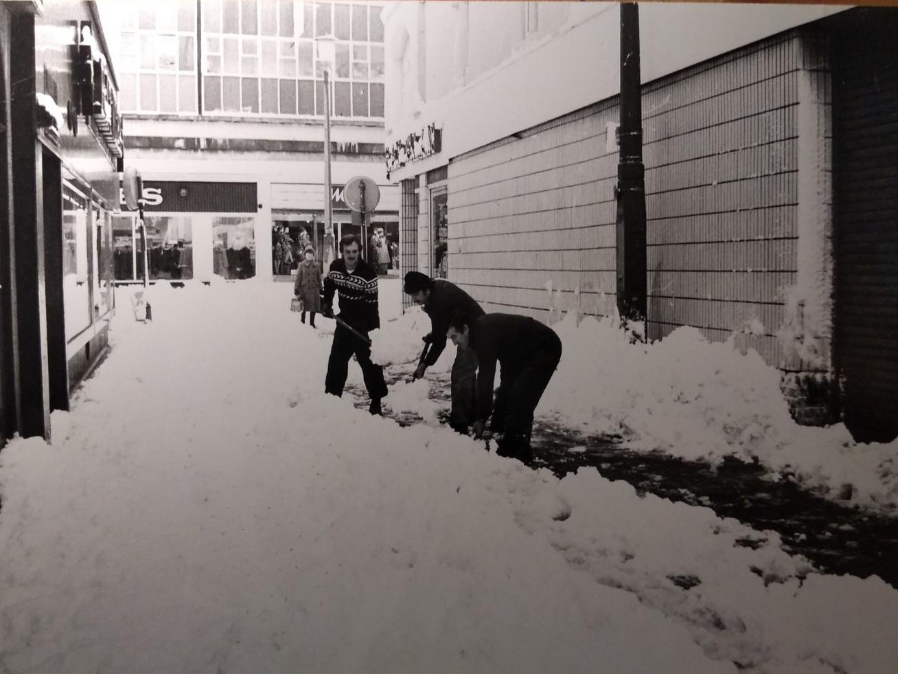 Shovelling snow outside the Evening Gazette offices in Blackpool town centre
