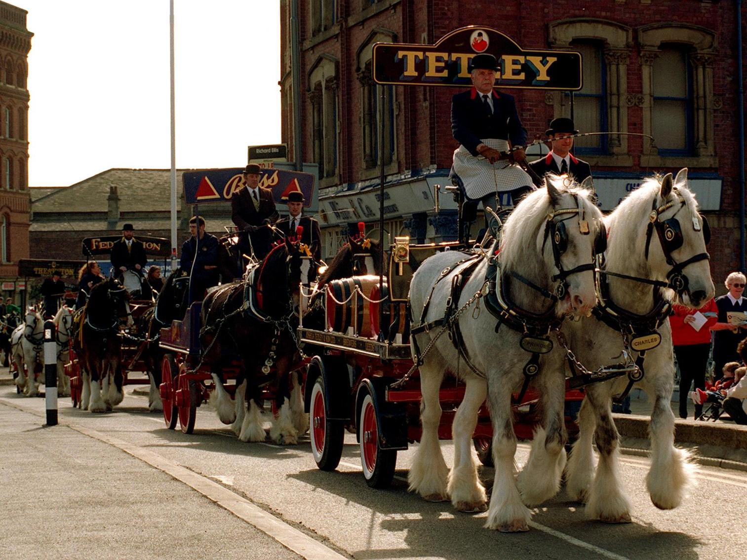Celebrating the third anniversary of the opening of Tetley's Brewery Wharf, a parade of seven brewers drays paraded through the city centre.