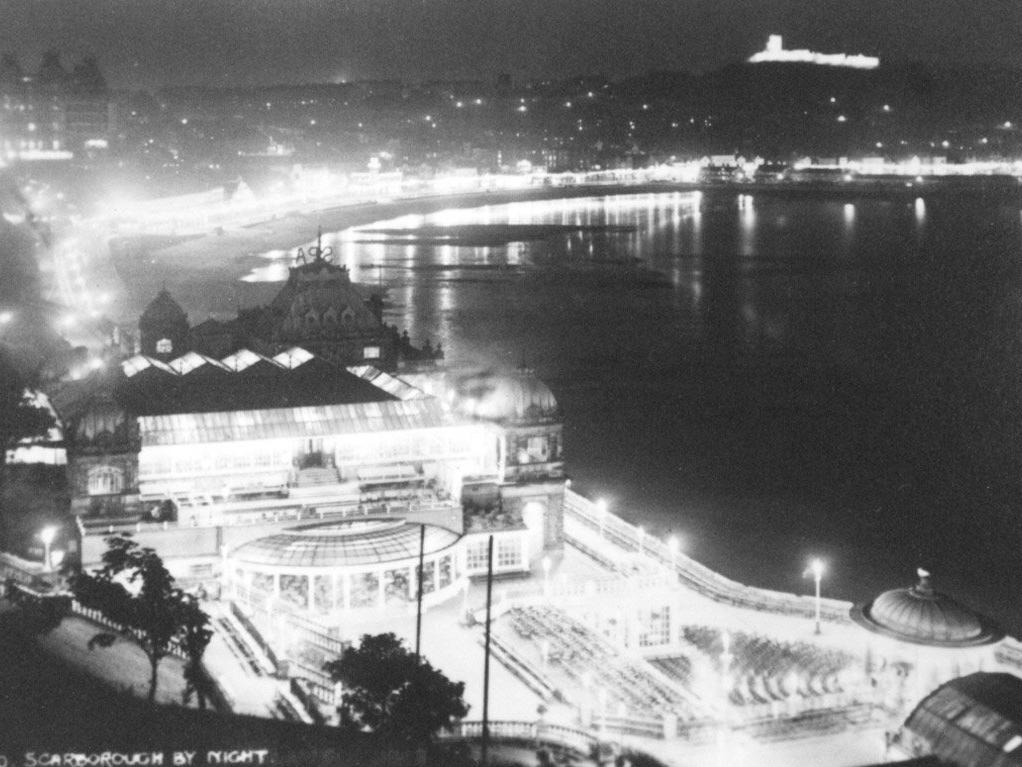 Even in 1930 the South Bay looked beautiful lit up. The glass screen of the bandstand was not added until 1954.