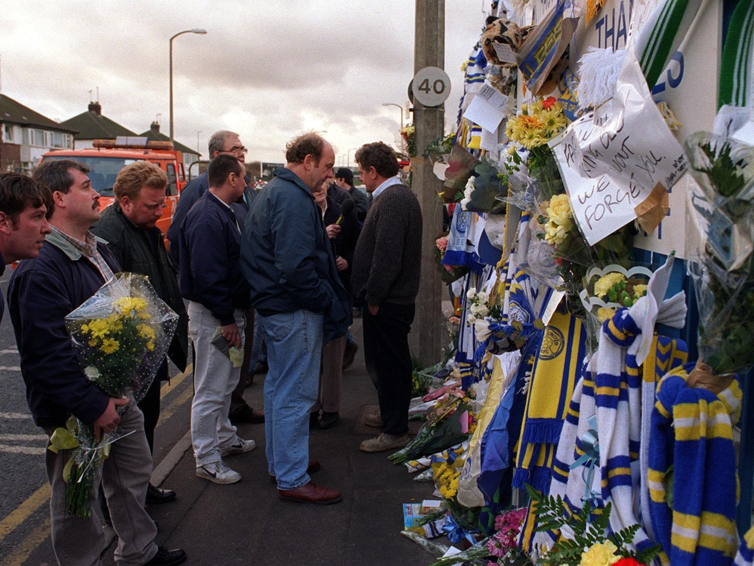 Tributes to the late Billy Bremner pile up outside the gates of Elland Road in December 1997