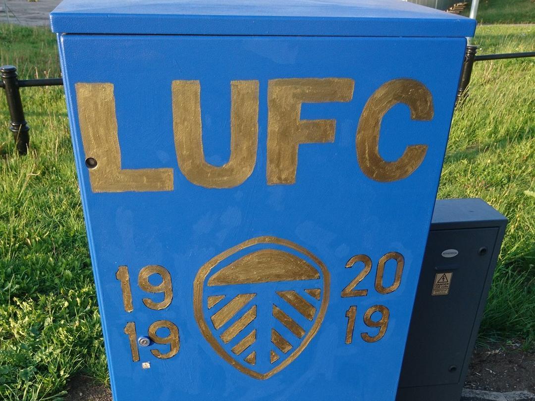 'LUFC 100' can be seen on the corner of Bobby Collins Way.