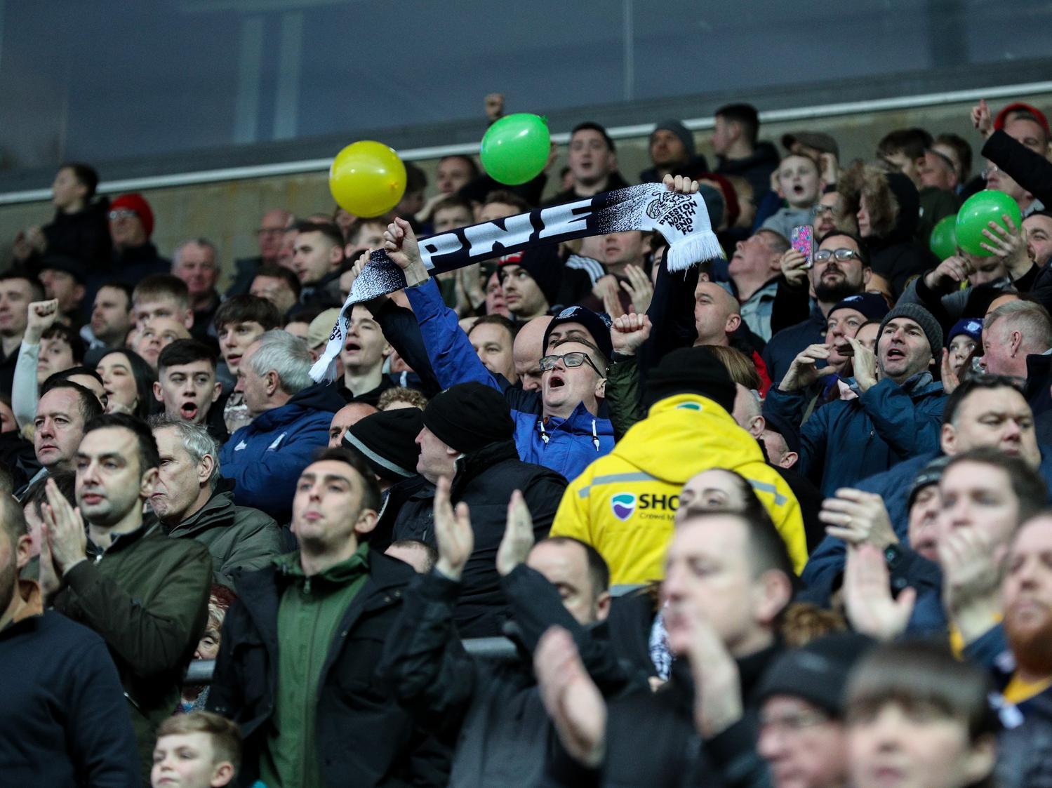 Preston fans cheer their side on at Ewood Park
