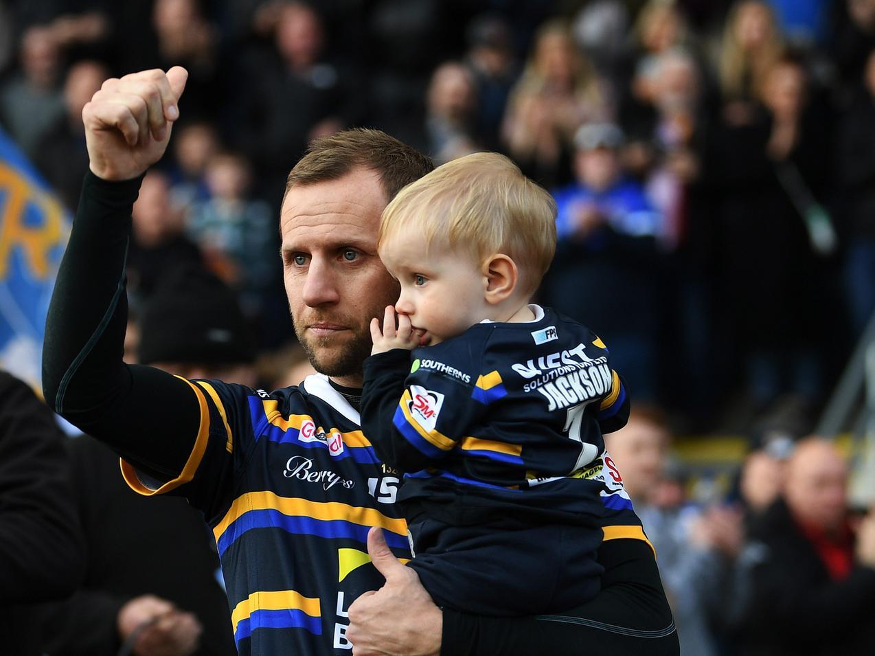 Rob Burrow on the pitch with his son Jackson.