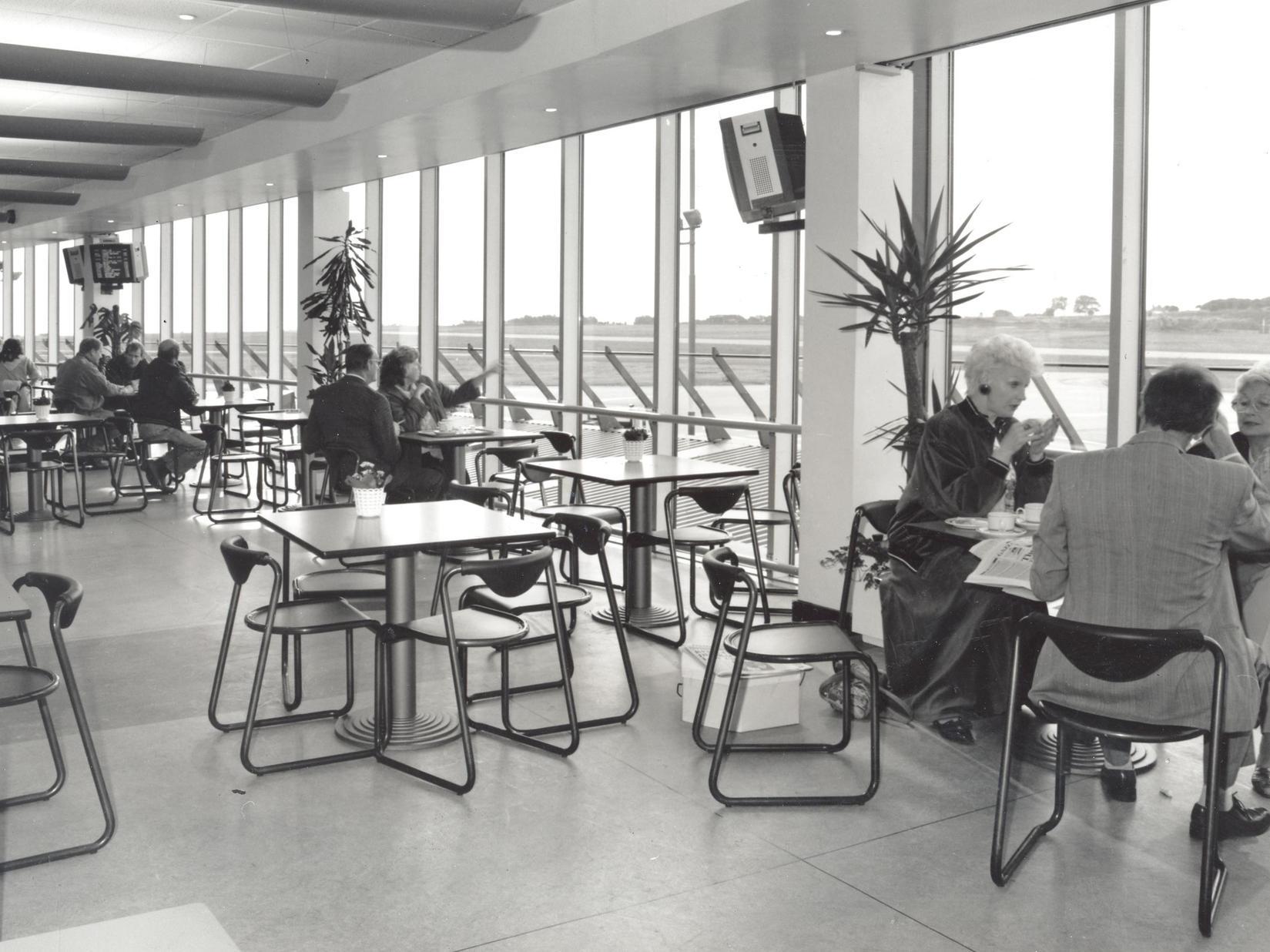 The Take Off Cafe with its wall of glass where travellers could watch aircraft arriving and departing.