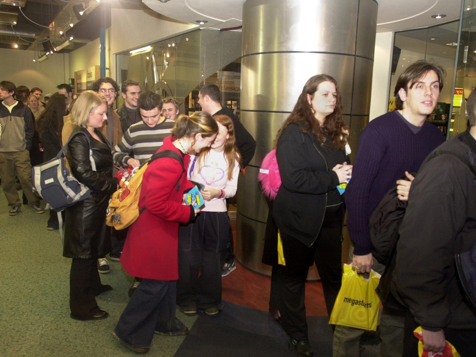 Fans queue to meet Terrorvision - best known for their hit Tequila - at Virgin Megastore in the city centre.