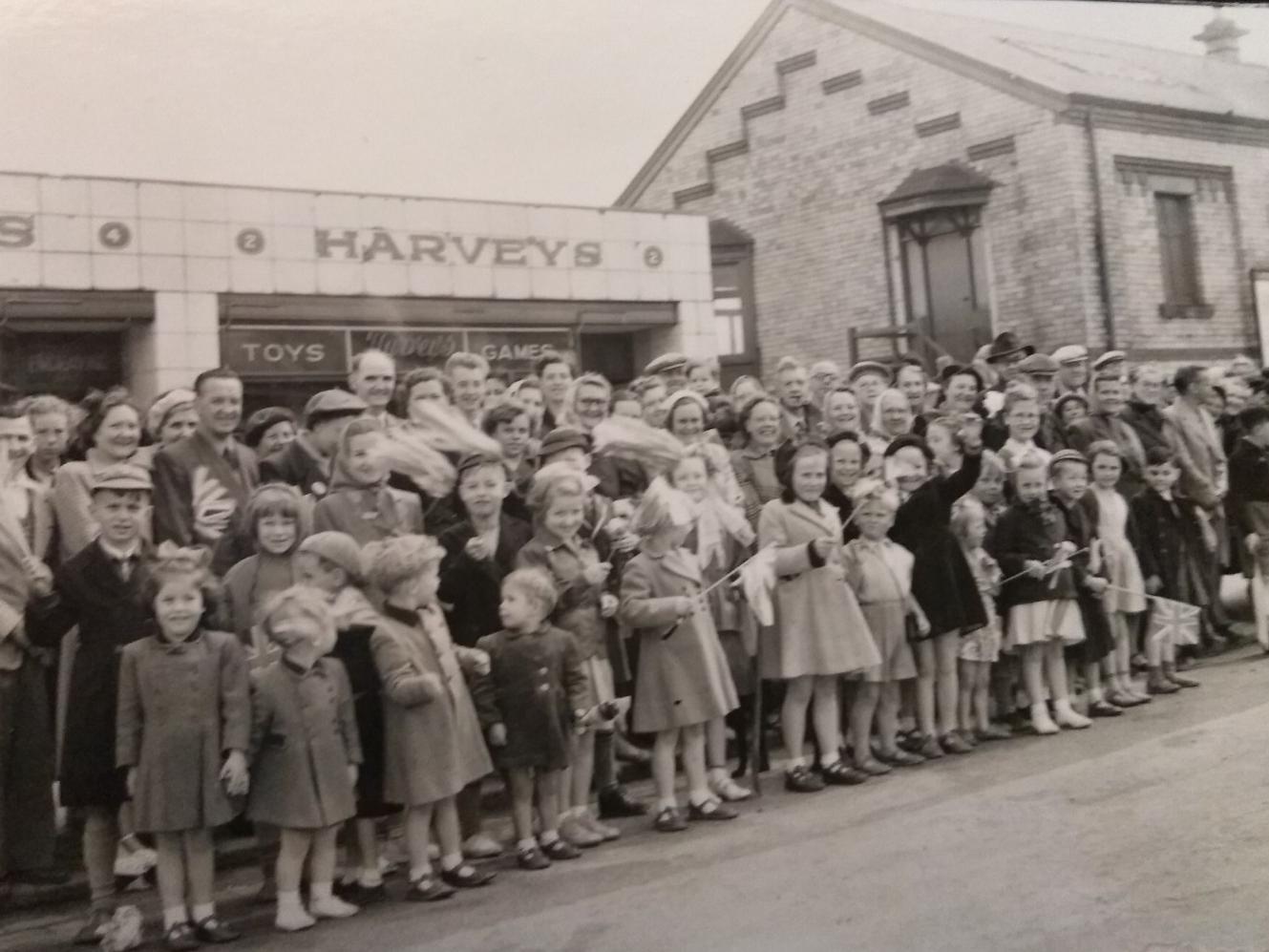 Children line the street near the old Fleetwood Railway Station to welcome Princess Margaret
