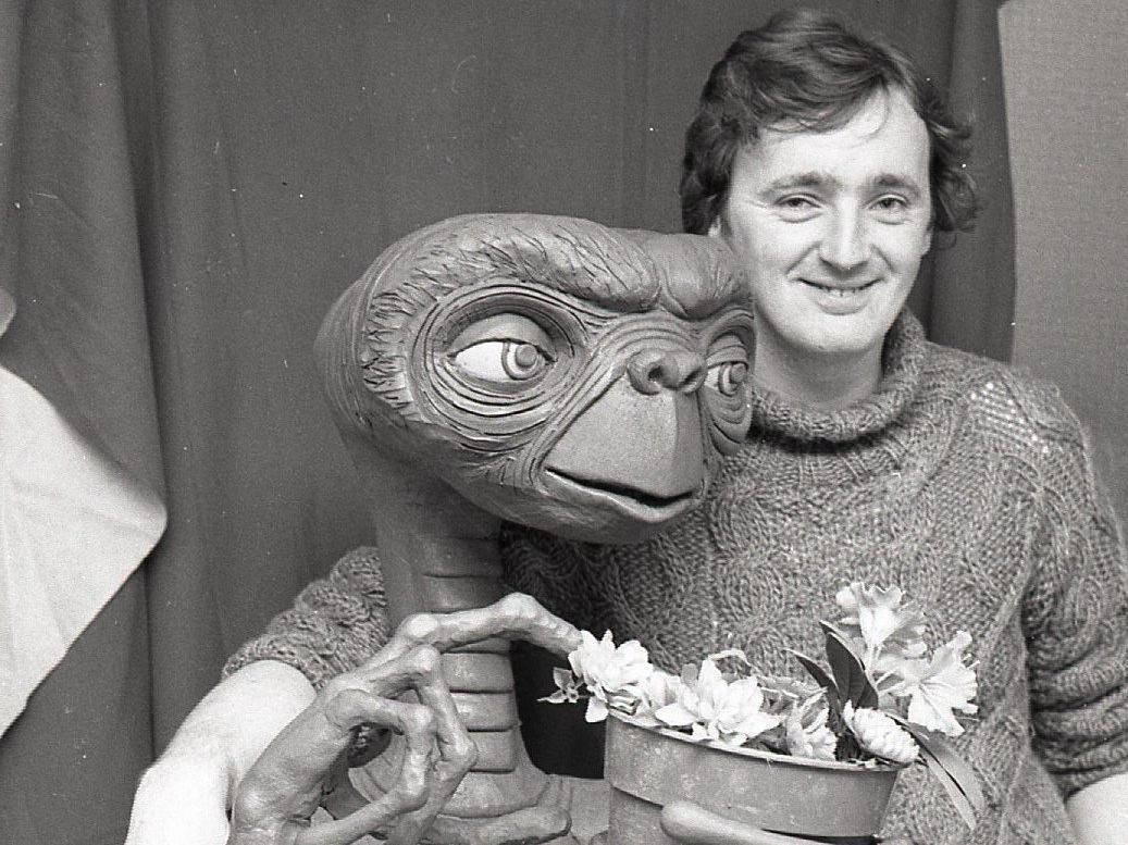 Screen hero E.T., set to become the most successful film star of all time, has received a new accolade. The loveable little monster, who thrilled cinemagoers throughout the world, will shortly join the ranks of the famous - at Blackpool's waxworks museum Louis Tussauds. Artist Michael Conroy, pictured above with E.T., built the 40in clay model around a wire mesh frame