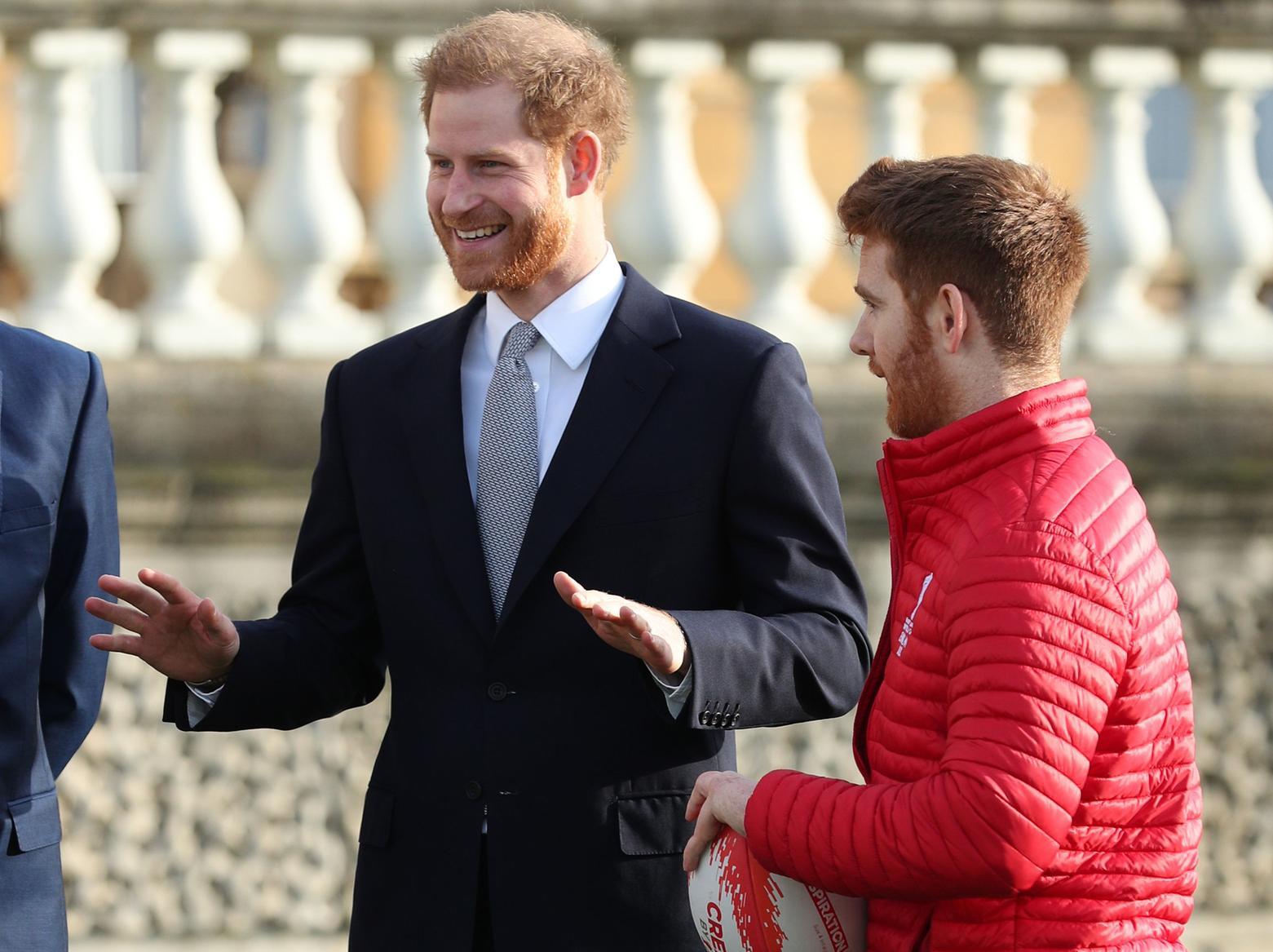 The Duke of Sussex talks with Leeds Rhino player, James Simpson, in the Buckingham Palace gardens, London, as he hosts the Rugby League World Cup 2021 draws