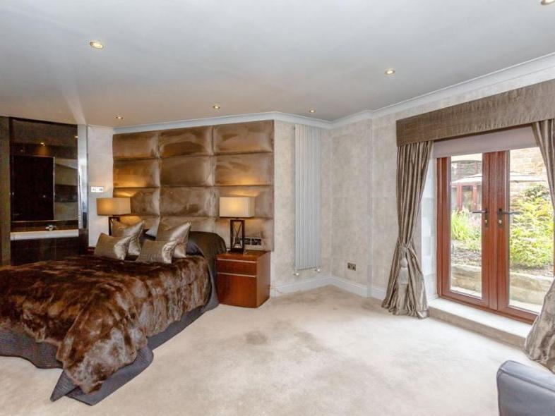The property features five bedrooms in total, all of which have been stylishly furnished and offer plenty of space.