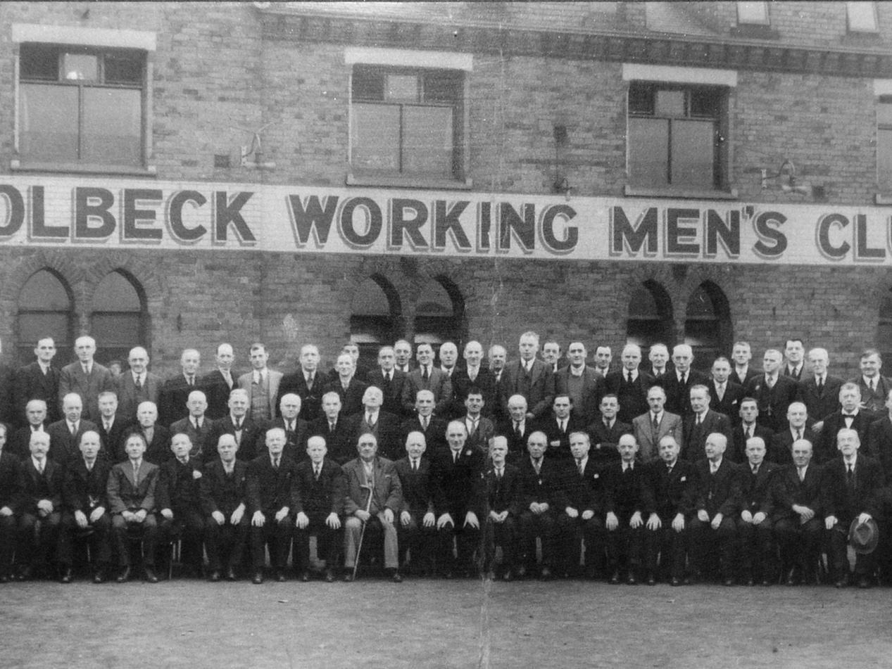 Members of Holbeck Working Men's Club wait to go on their annual trip to the seaside. (date unknown)
