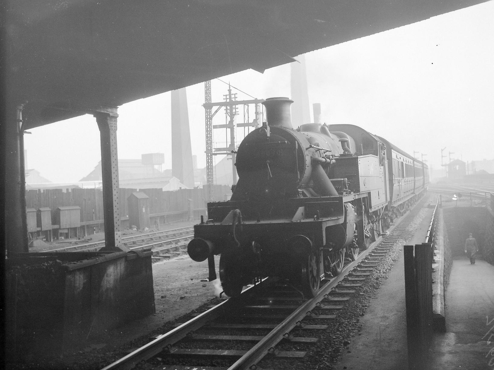 A Leeds to Ilkley stopping train draws into Holbeck (Low Level) Station in November 1951.