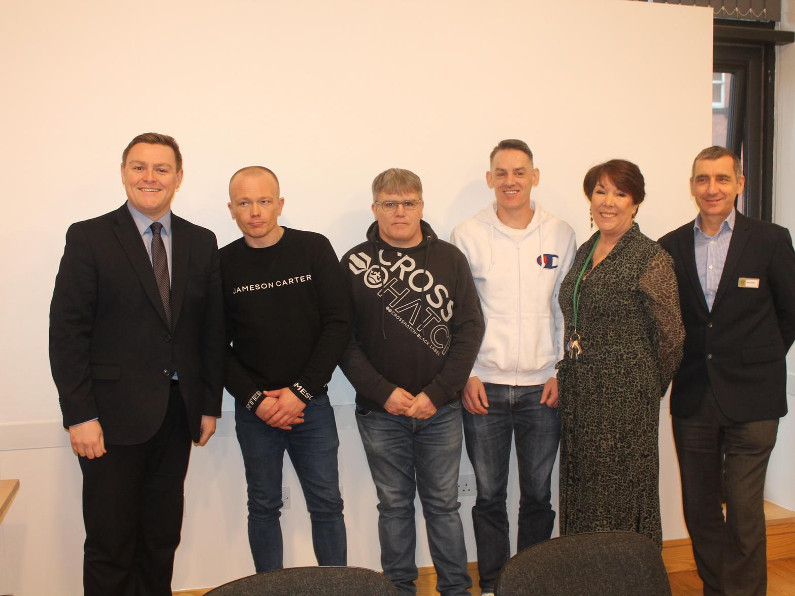 Will Quince (left) meets service users and staff at St George's Crypt in Leeds. Picture by Bhekisipho Siwawa