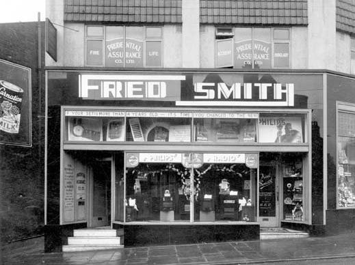 Fred Smith electrical engineer was located at the corner of Harrogate Road and Stainbeck Lane. Shop window has a display of radios and advertisements for Philips Company. The upper floor is premises for Prudential Assurance Co Ltd