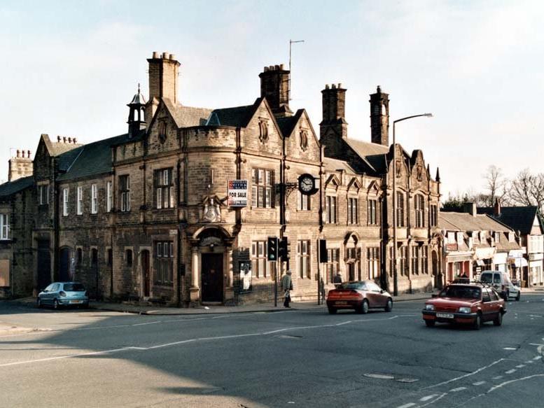 A view of old Chapel Allerton police station which closed in the late 1990s. Parade of shops can also be seen.