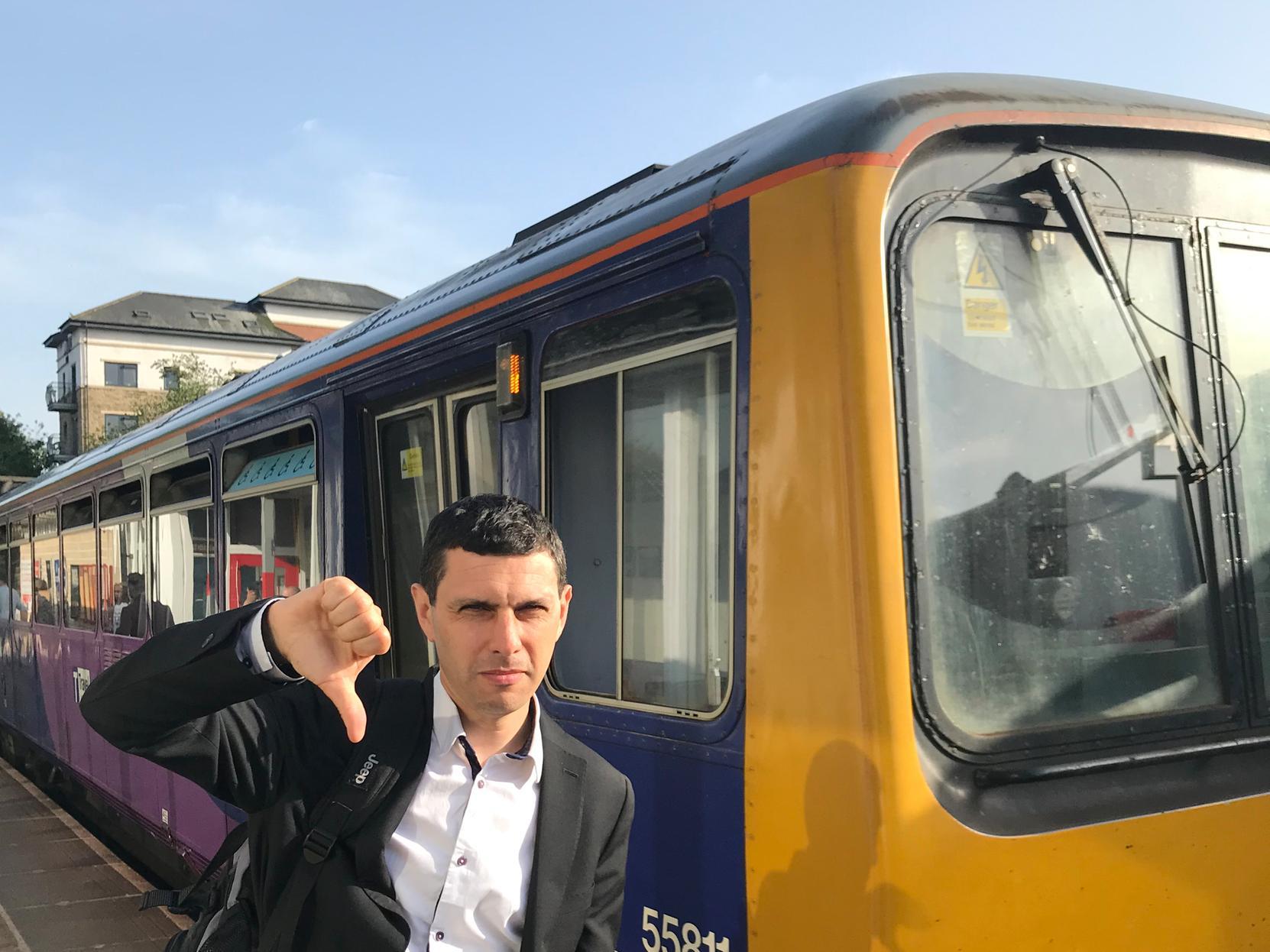 MP Alex Sobel gives the thumbs down to a Northern Pacer train.