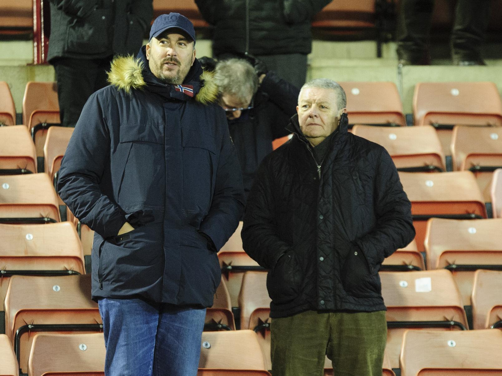 A pair of North Enders wait for the game to get going at Oakwell.
