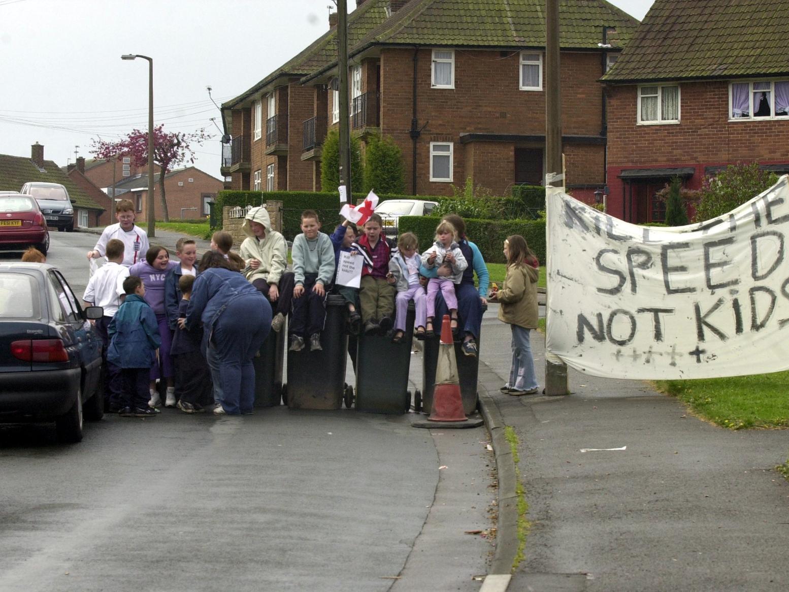 Local residents block Queenshill Avenue in Moortown, which they claimed was being used as a 'rat run' by drivers trying to avoid roadworks on the nearby ring road.