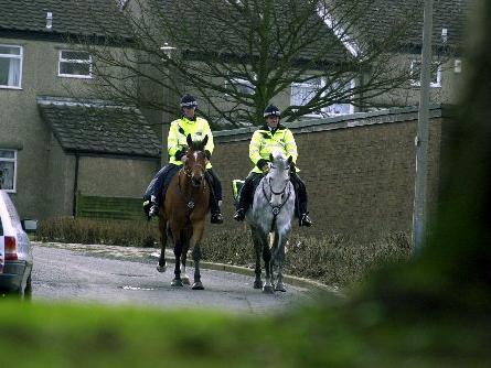 Mounted police constables Lance Oyston on Bramham and John Meechan on Boston patrol the Holt Park estate after complaints of anti-social behaviour in the area.