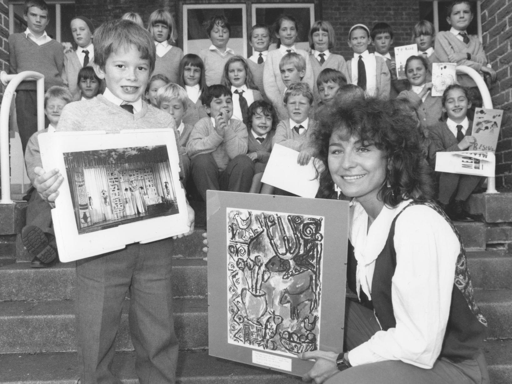 Artist in residence at Newby School Raine O'Hare presented one of her paintings to the children in September 1994, and in turn pupil James Murray presented Raine with a picture to mark her time at the school.